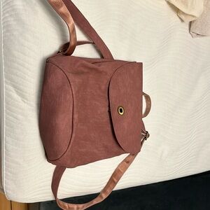 Brand new Mia & Tess pink backpack.